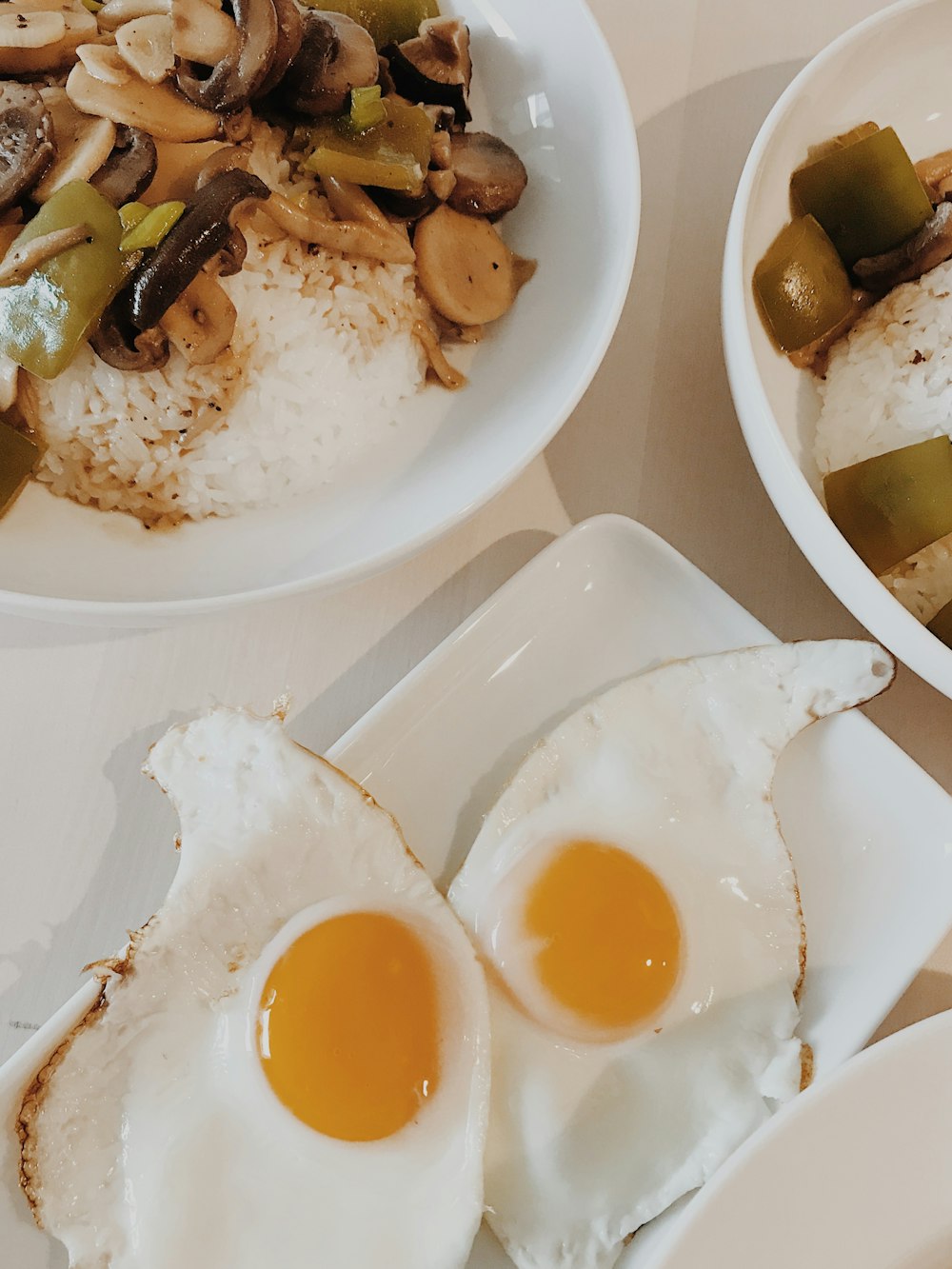 sunny side up egg on white ceramic plate