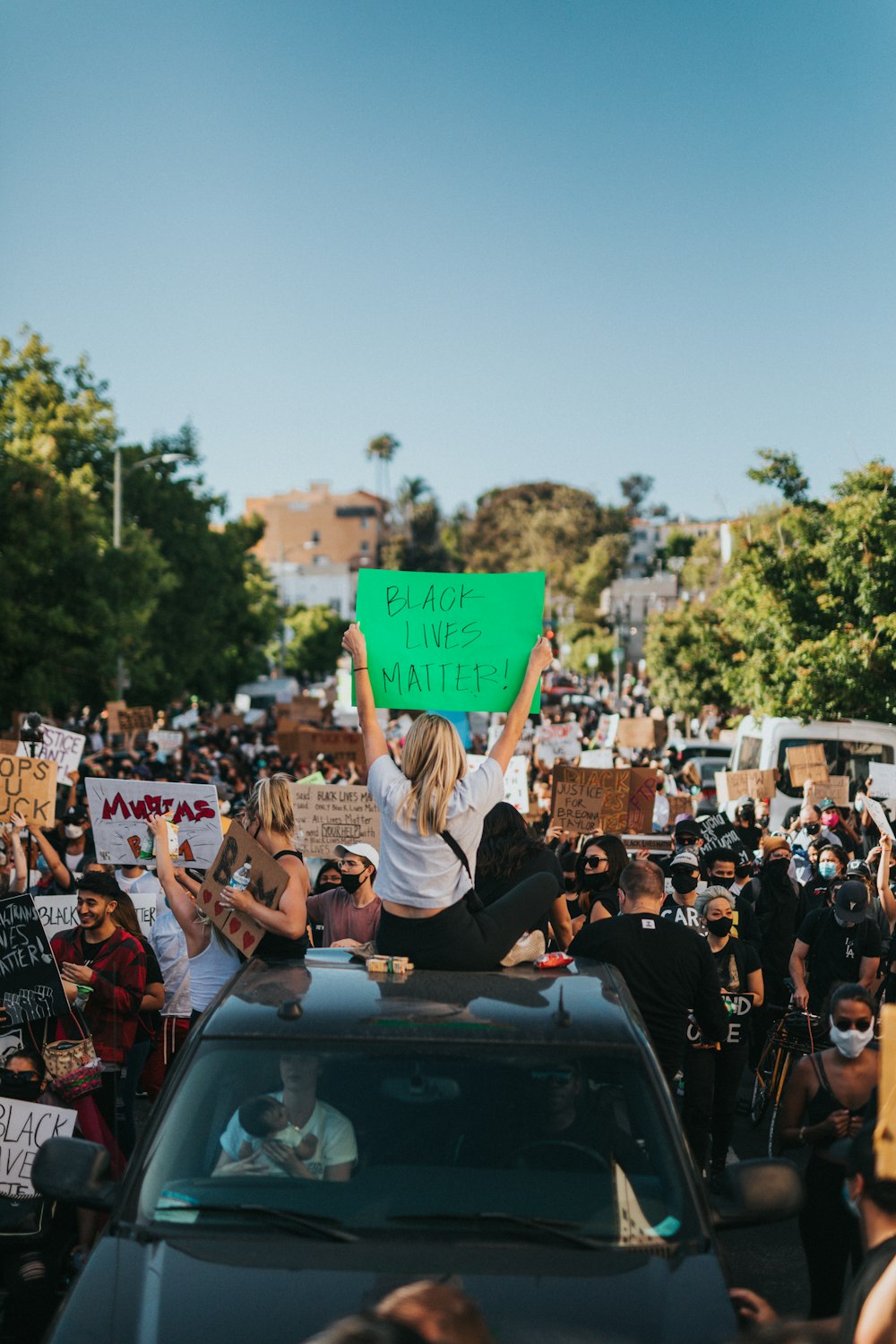 people gathering on street during daytime