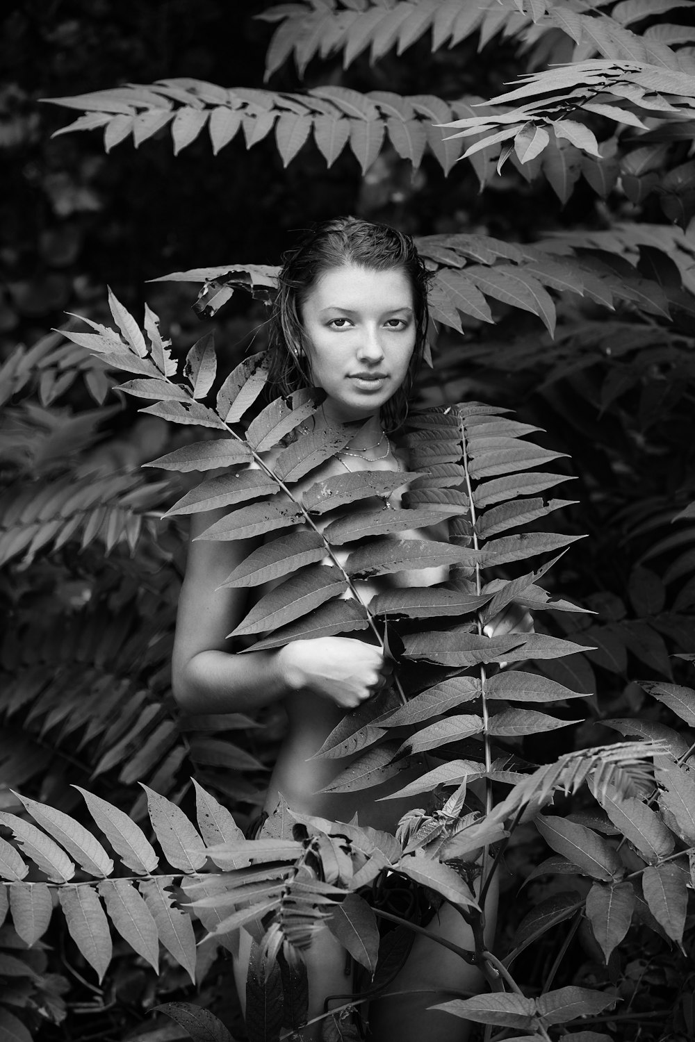 grayscale photo of woman in sleeveless dress