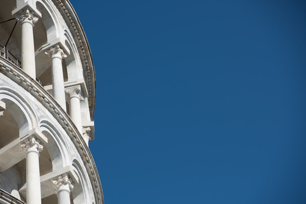 white concrete building under blue sky during daytime