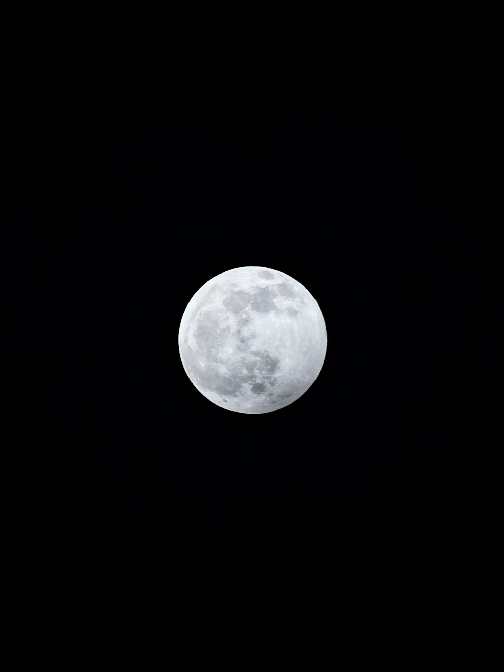 full moon in dark night sky