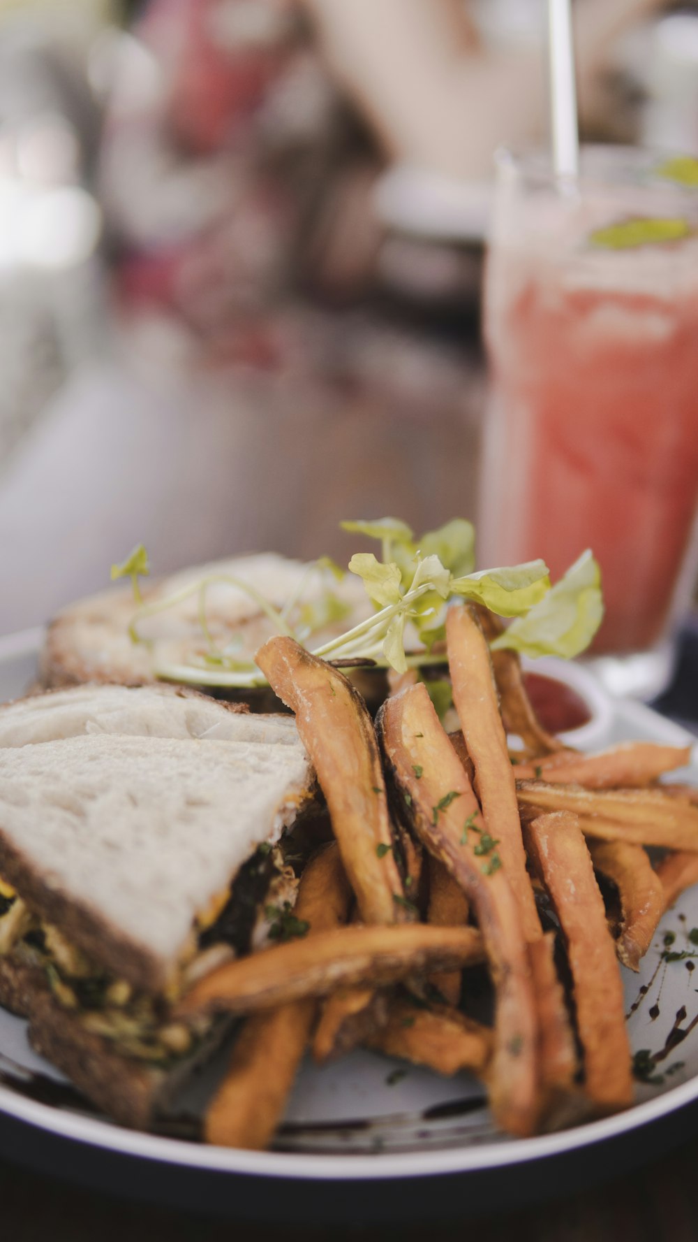 burger with fries and vegetables