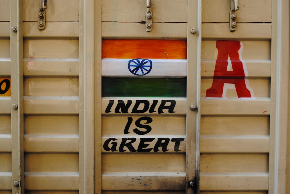 india is great written on the side of a train