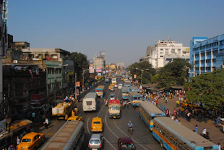 cars on road near buildings during daytime