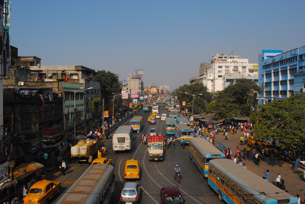 cars on road near buildings during daytime