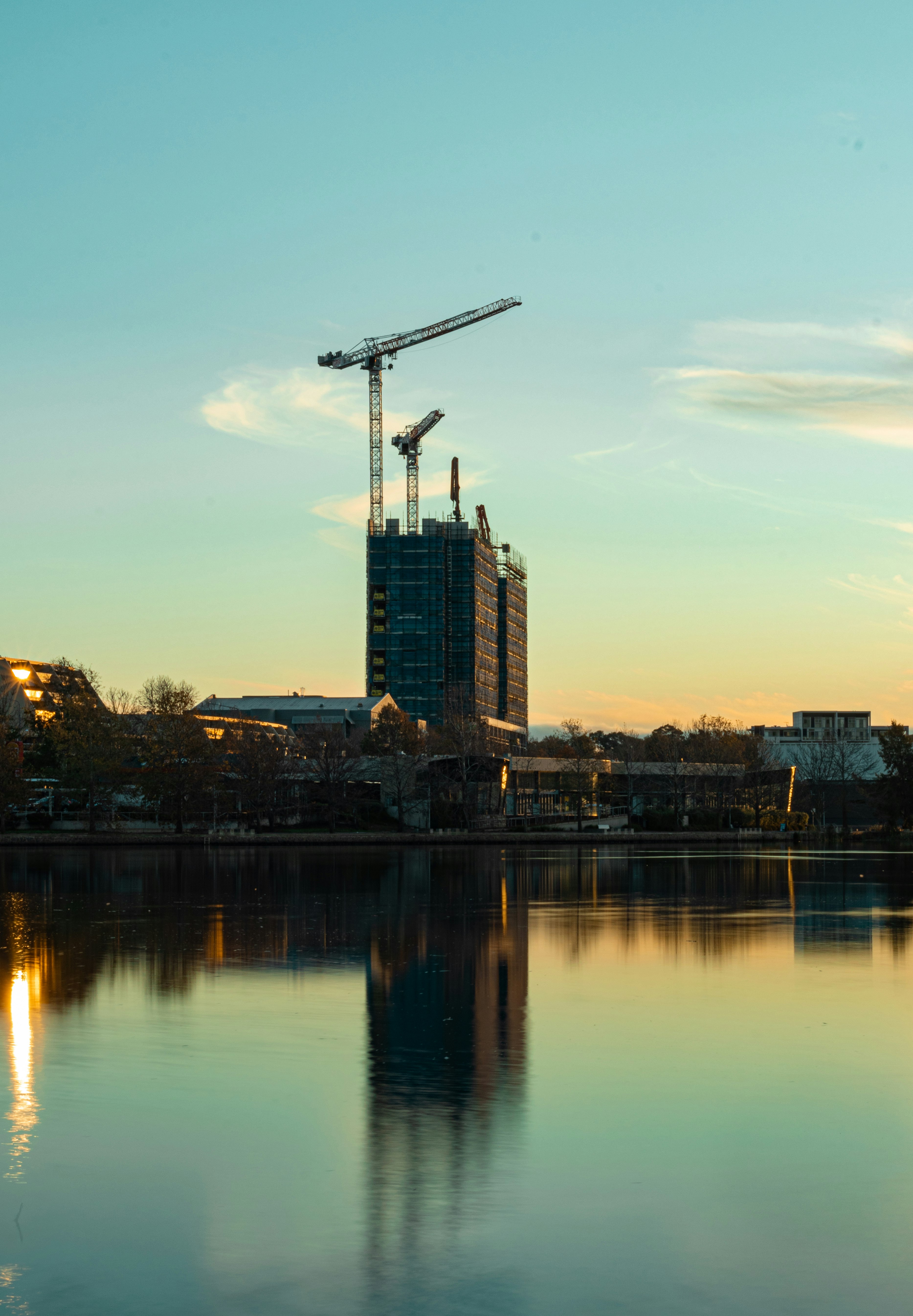 high rise buildings near body of water during daytime