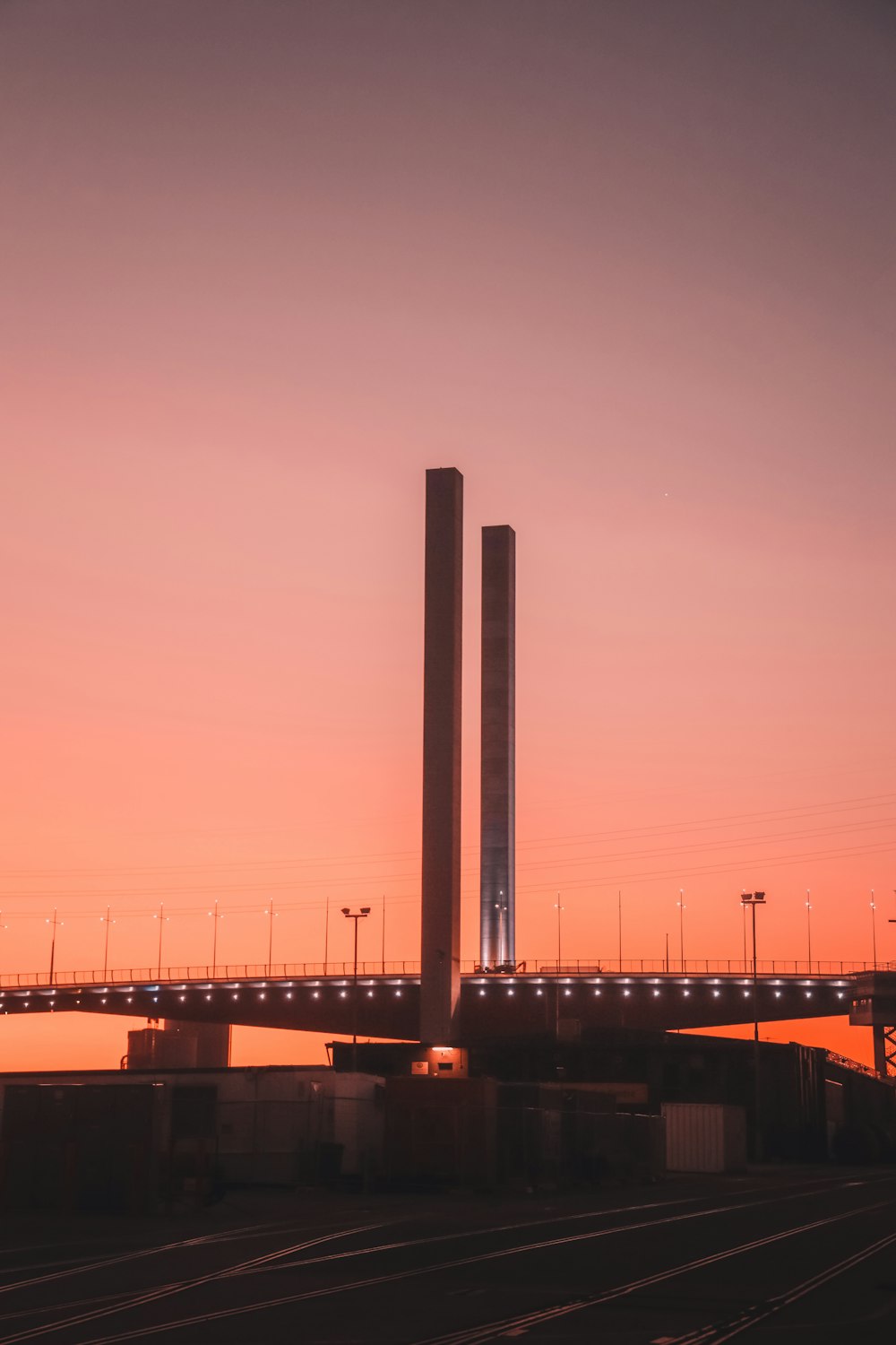 silhouette of bridge during sunset