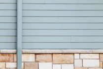 white wooden window frame on white brick wall