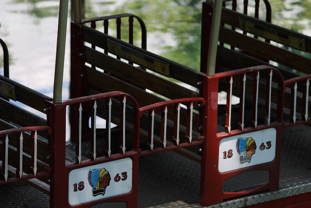 hello kitty sticker on red wooden bench