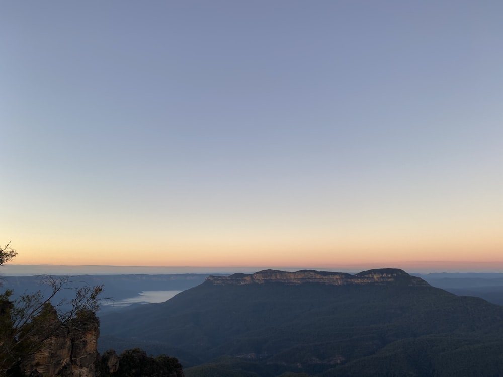 green mountains under blue sky during daytime