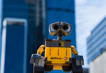 yellow and gray robot toy