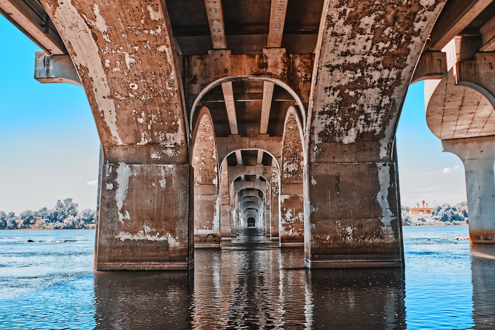 brown concrete bridge over water
