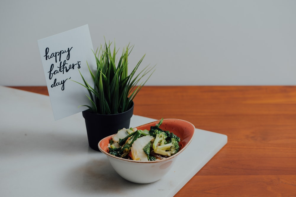 green plant on white ceramic bowl