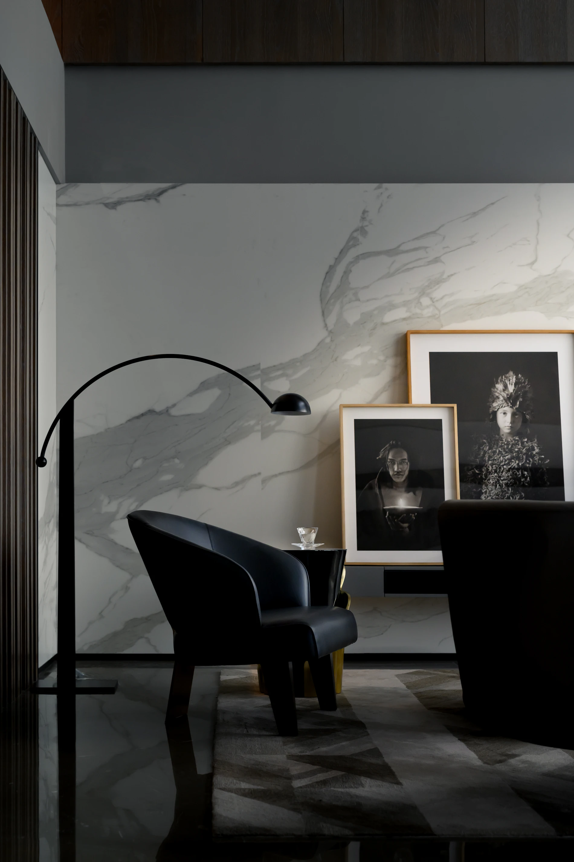 A quiet, contemporary room with a dark table and chairs