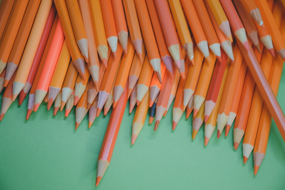 orange and blue color pencils