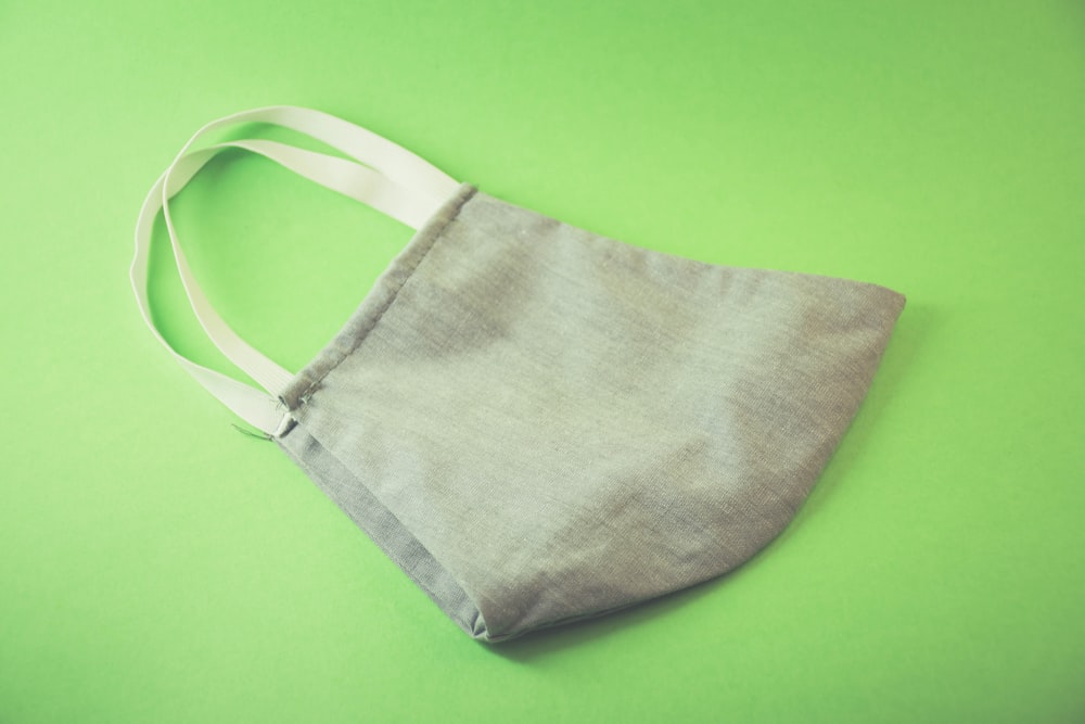 gray and white tote bag