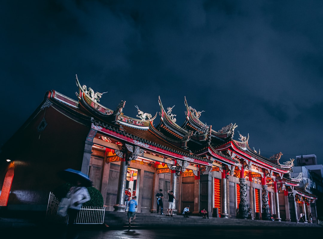 red and white temple during night time