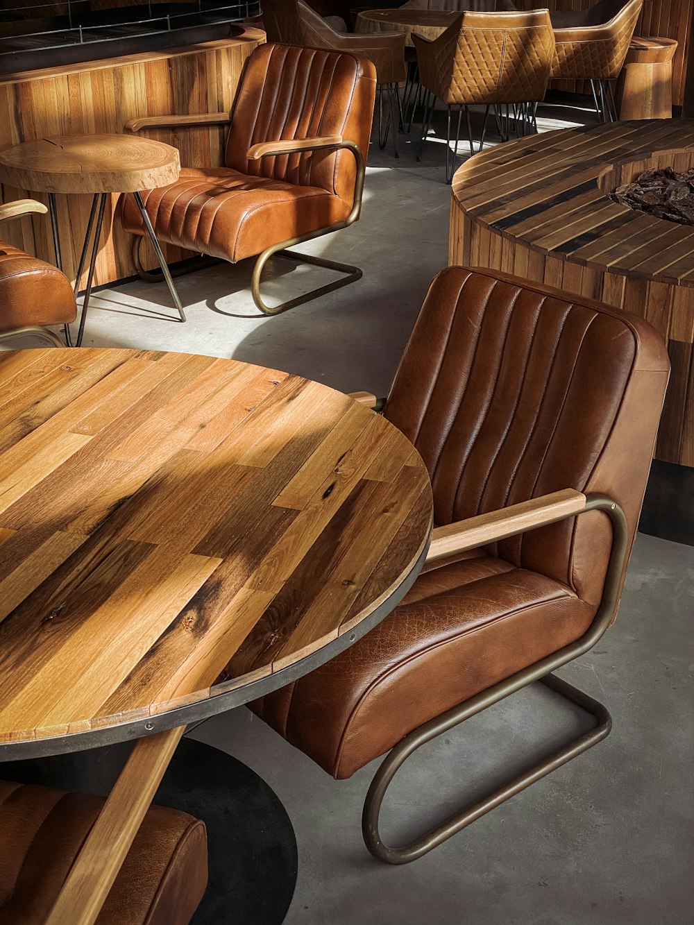 brown wooden table and chairs