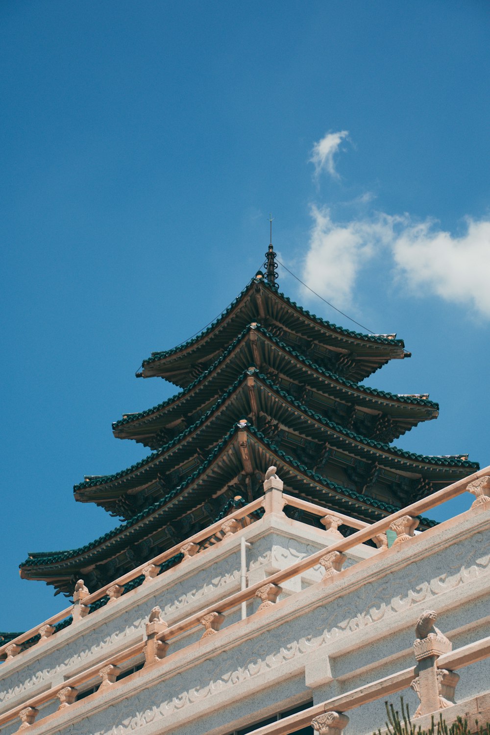 white and brown temple under blue sky during daytime