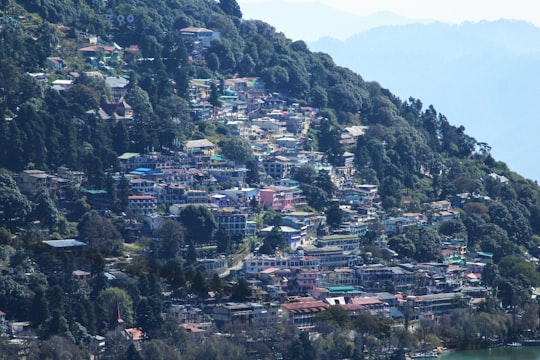 aerial view of city on mountain during daytime in Nainital India