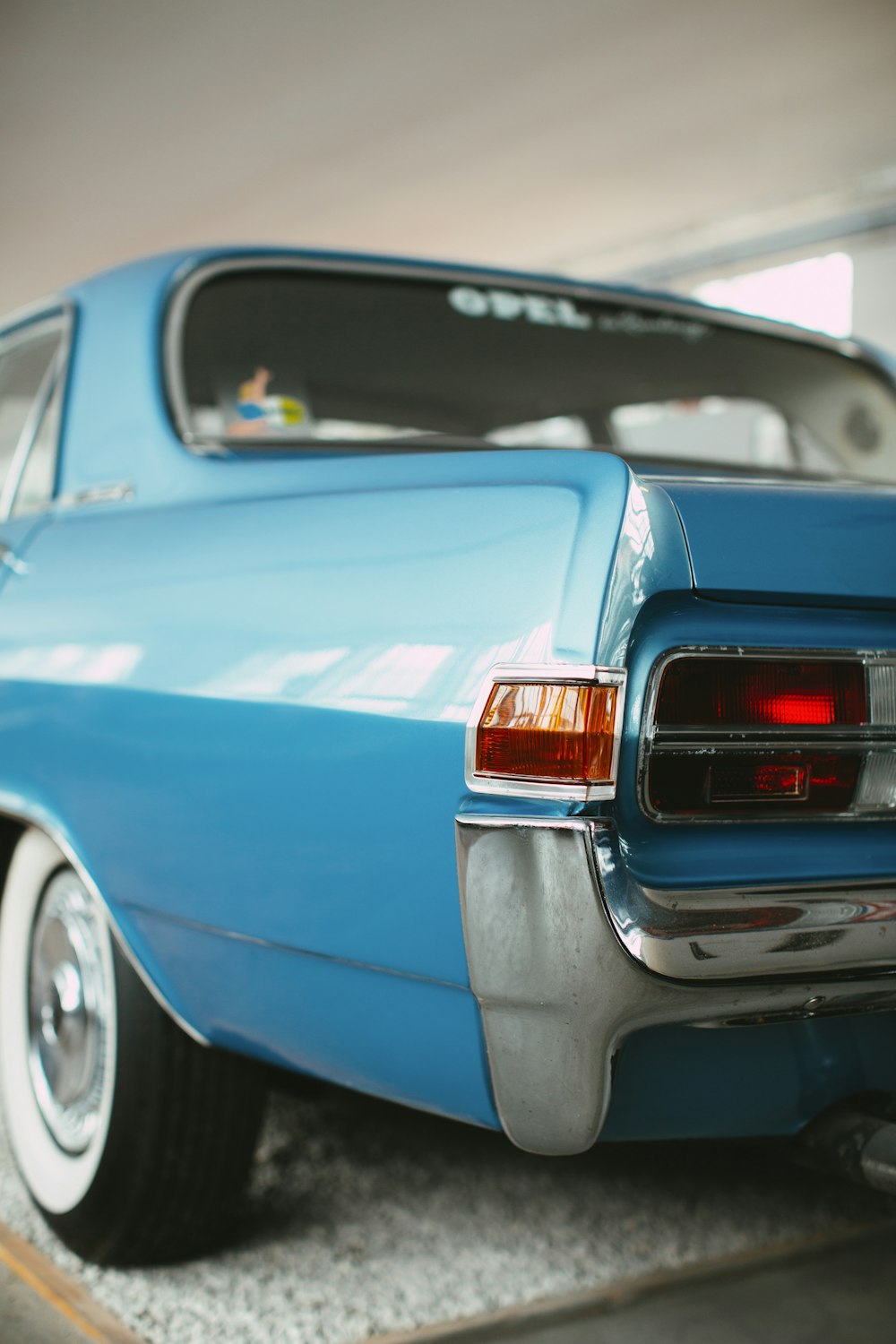 blue chevrolet camaro in close up photography