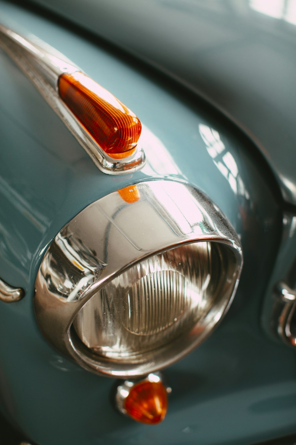 green car with silver headlight