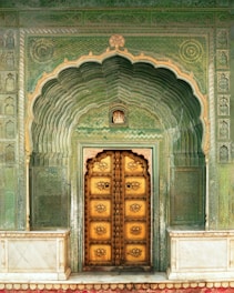 brown wooden door on gray concrete building
