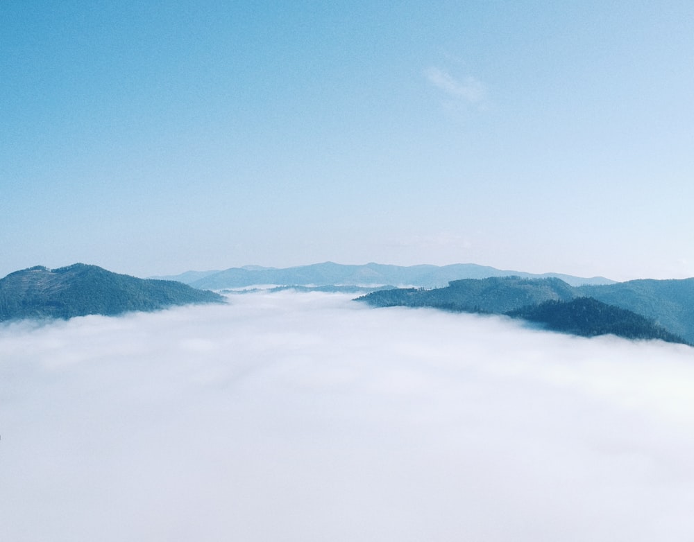 snow covered mountain under blue sky during daytime