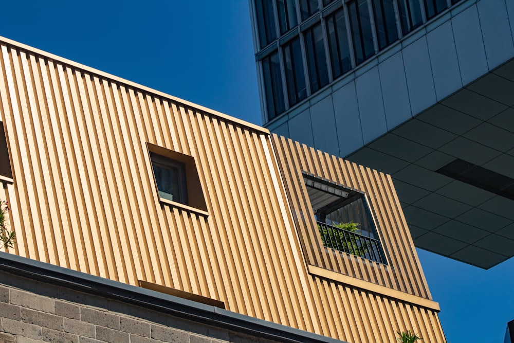 beige concrete building under blue sky during daytime