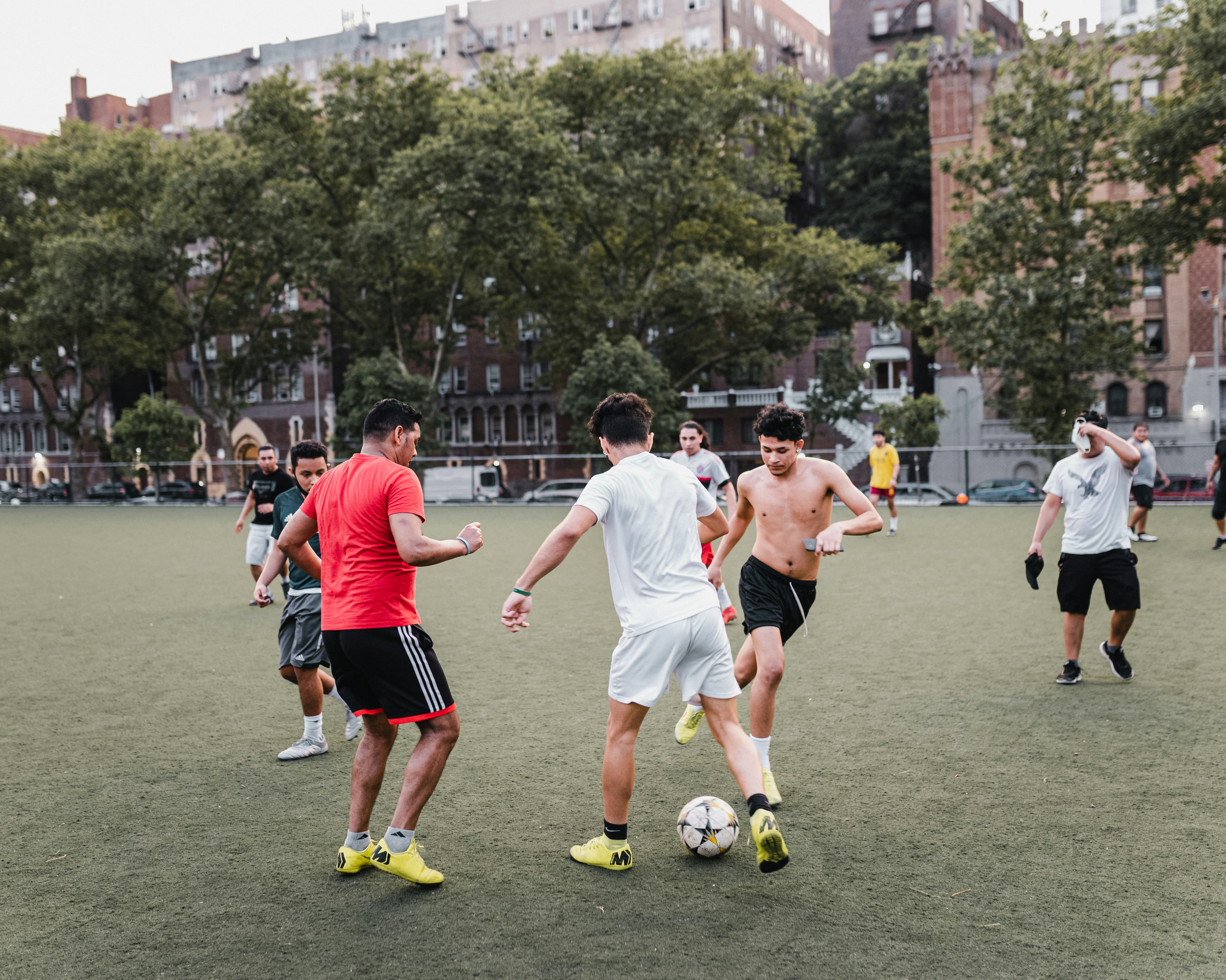 how to play soccer - empty football field in aerial photgraphy