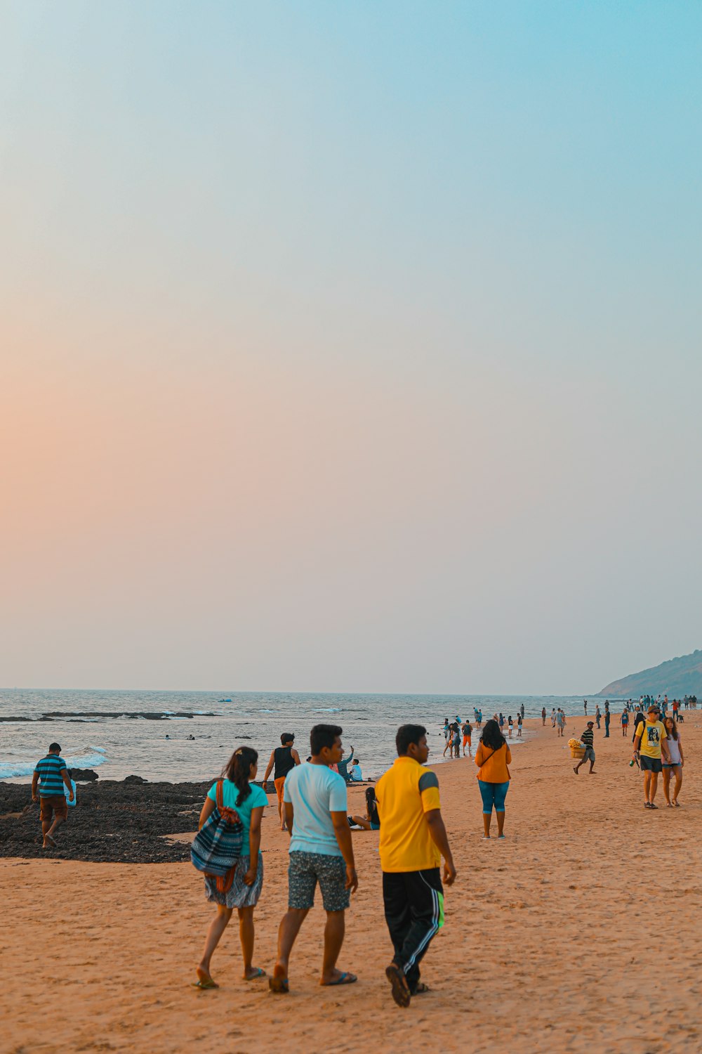 people on beach during daytime