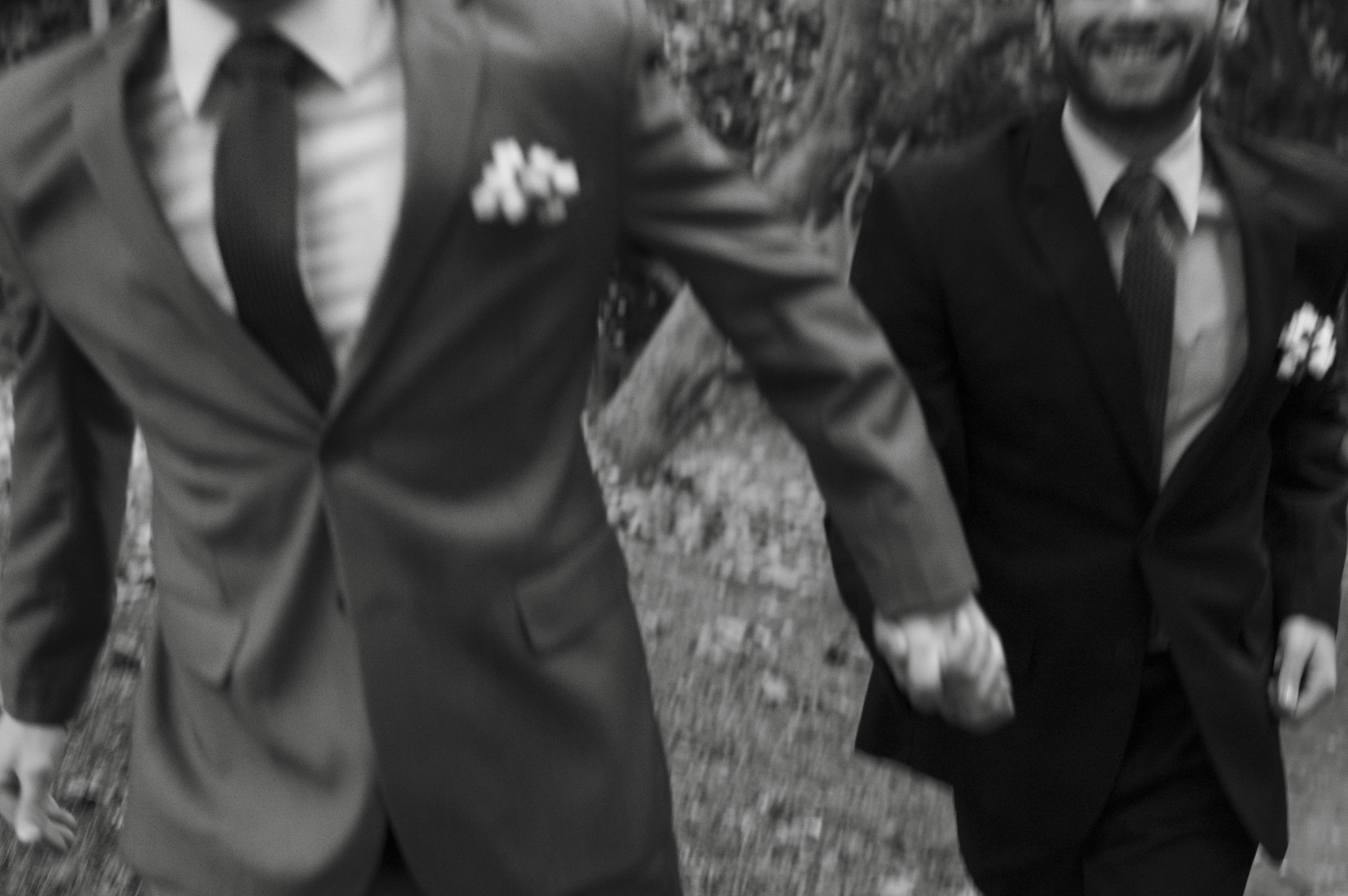 Gay couple running trought the park, feeling happy
