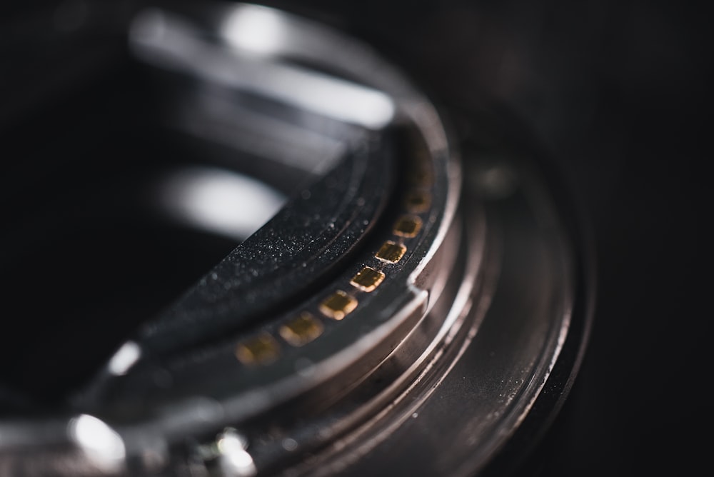 black camera lens on brown wooden table