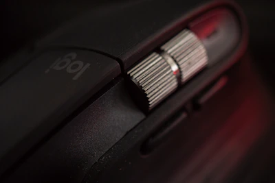 Close-up of a mouse with bold, explosive red and orange design.