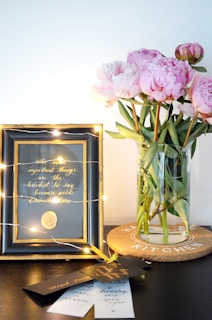 A decorative home decor item featuring a meaningful quote.