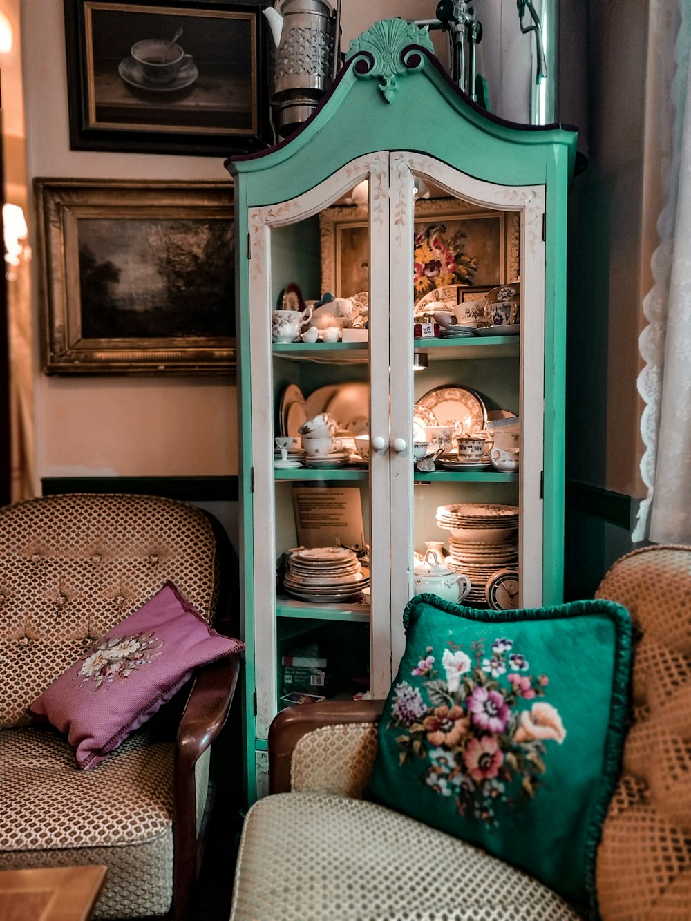 brown wooden glass cabinet with mirror