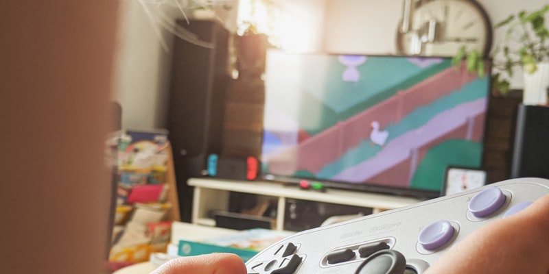 A child playing colorful videogames