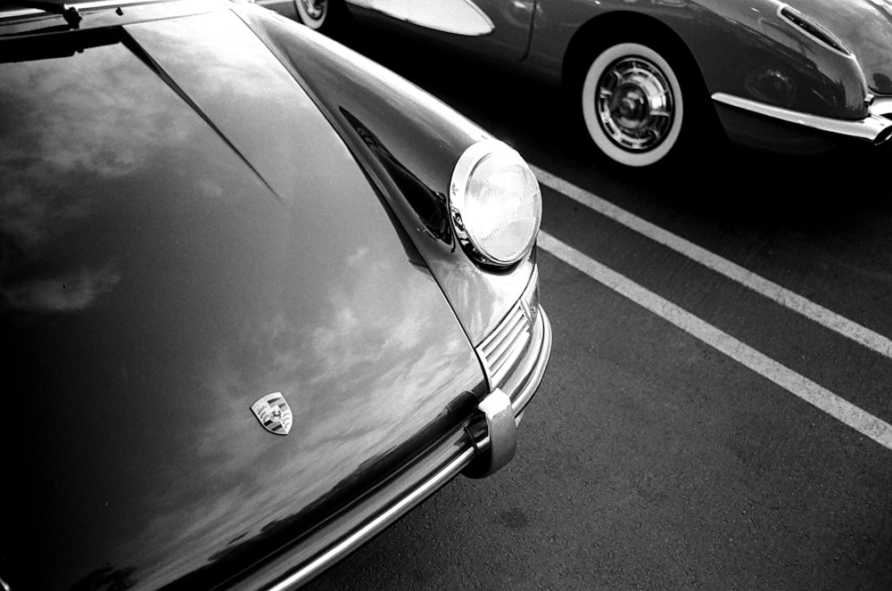 grayscale photo of car headlight