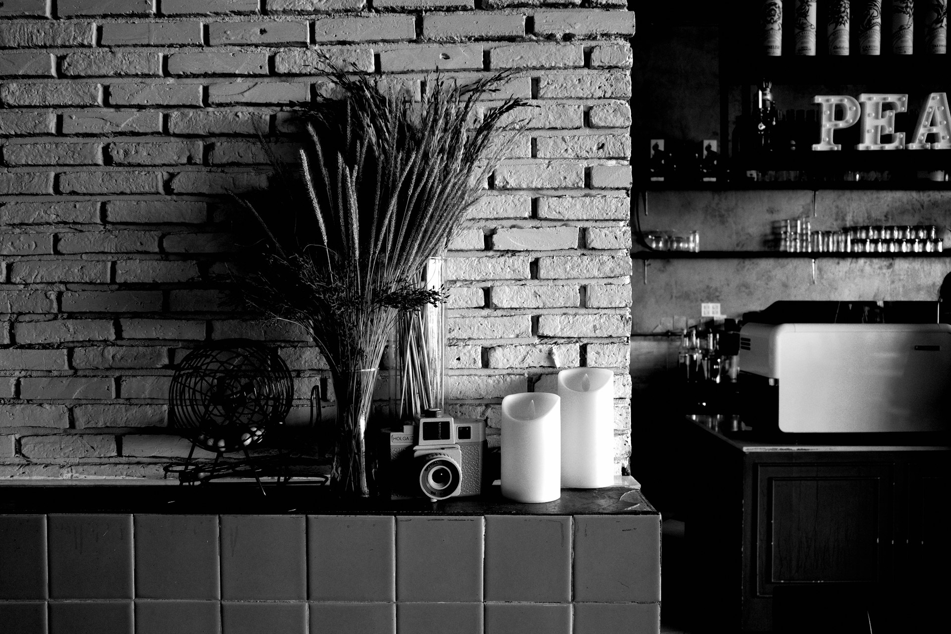 white toilet paper roll beside white ceramic mug on table