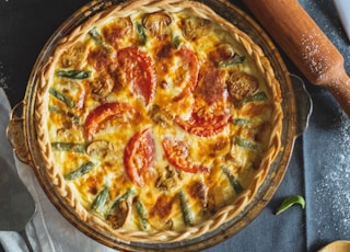 pizza on brown wooden tray