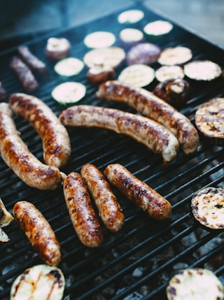 brown sausage on black grill