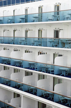 A set of space-saving travel organizers arranged on a cruise ship balcony.