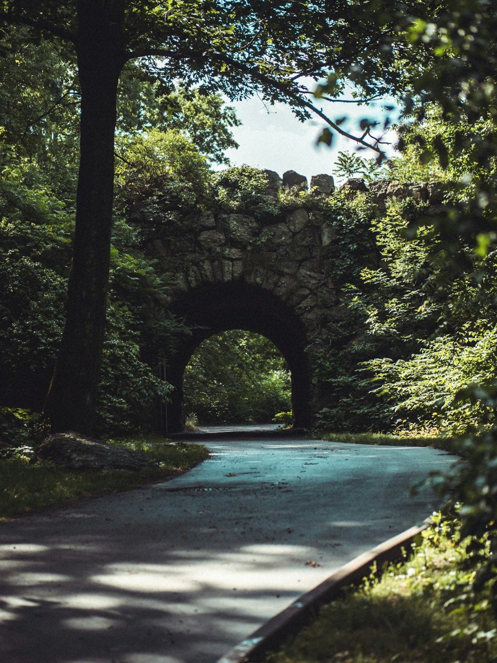 gray concrete bridge over river