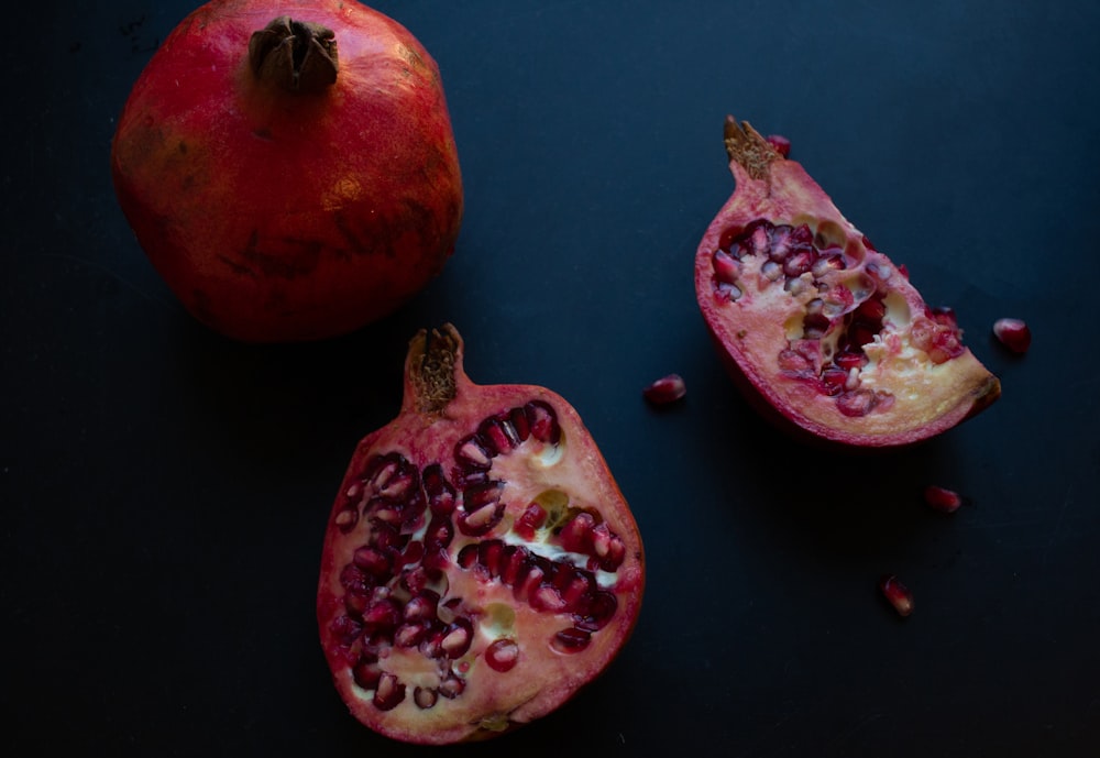 red fruit on black surface