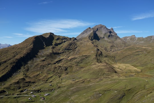 green and brown mountain under blue sky during daytime in Eiger Ultra Trail Switzerland