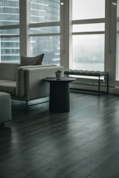 gray sofa chair near window