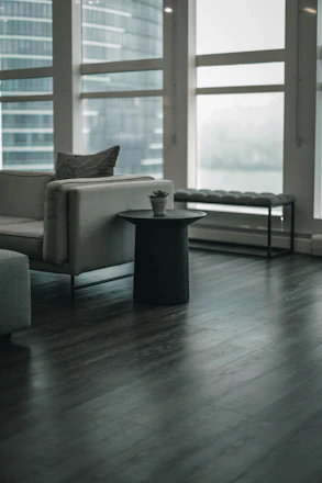 gray sofa chair near window