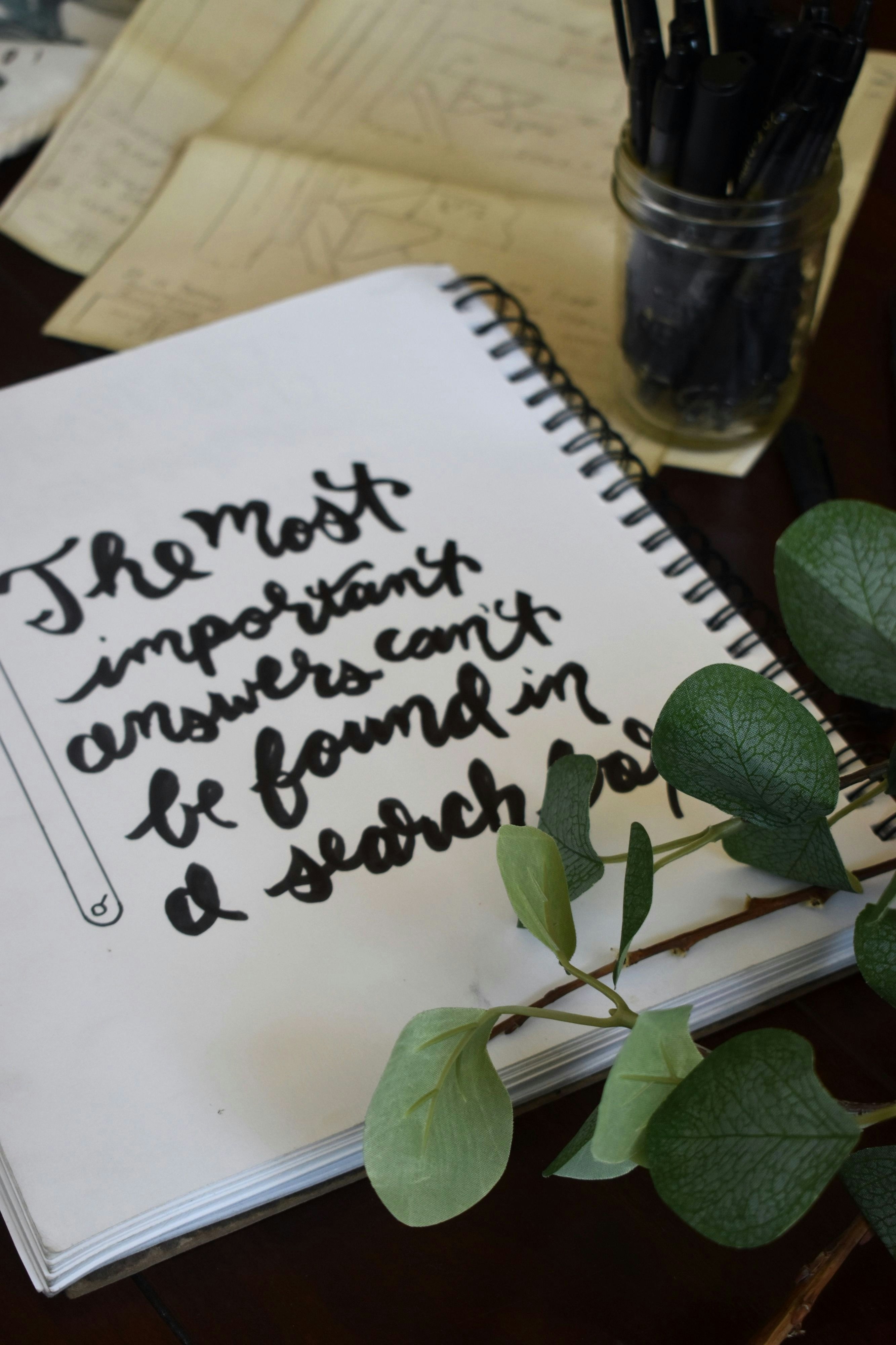 green plant on white paper