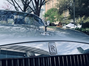 black mercedes benz car on road during daytime