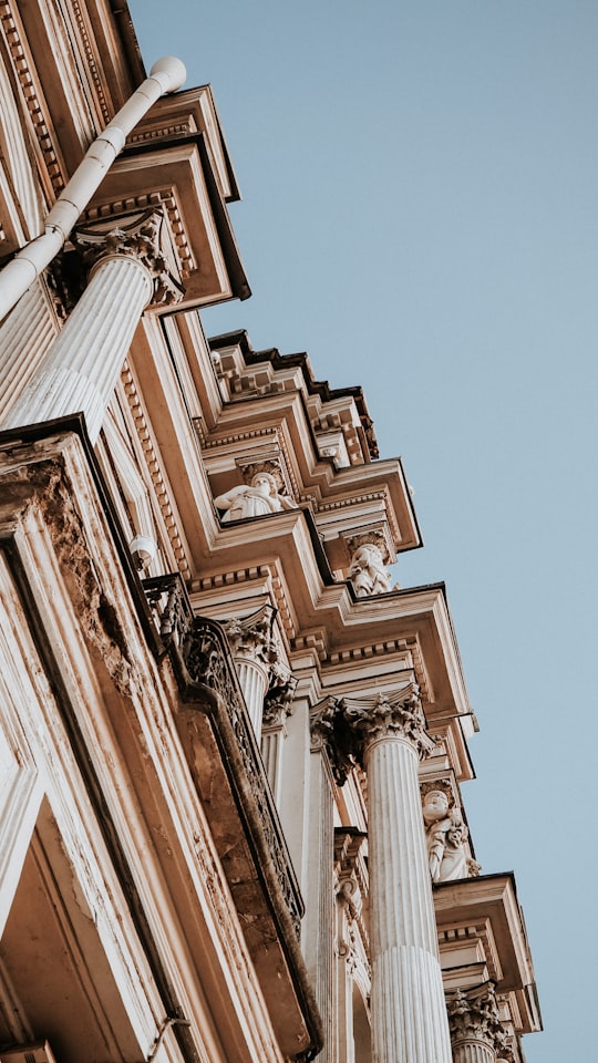 low angle photography of brown concrete building in Dvortsovaya Embankment Russia